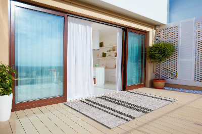 Nowoczesny dywan na balkon wzór Szary w linie